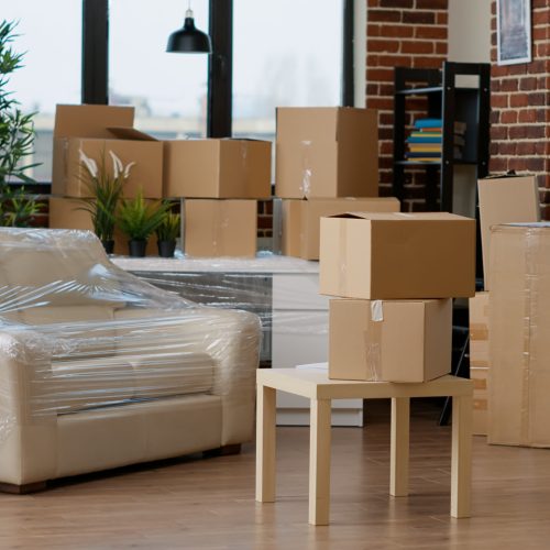 Empty household space with cardboard boxes used for relocation